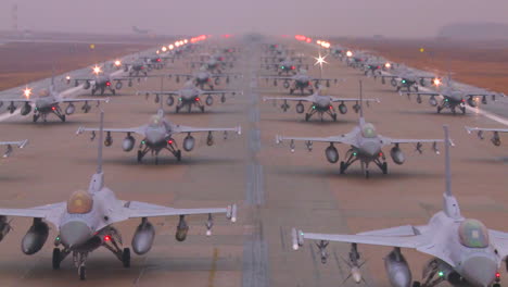 Zoom-Back-From-Dozens-Of-Air-Force-Jet-Aircraft-Parked-And-Ready-On-A-Runway