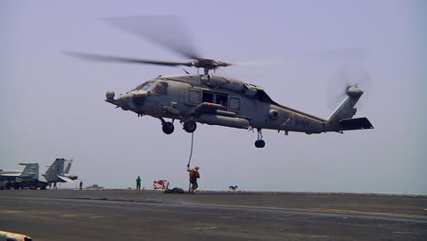 Helicopters-Drop-Troops-Who-Rappel-Onto-The-Deck-Of-An-Aircraft-Carrier-1