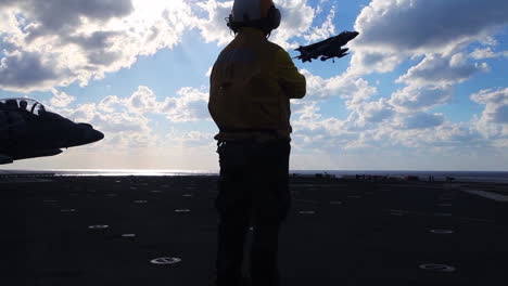 Marine-Harrier-Aircraft-In-Action-On-The-Deck-Of-An-Aircraft-Carrier-3