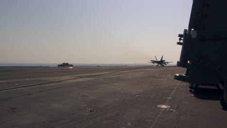 Various-Jet-Aircraft-Land-On-The-Deck-Of-An-Aircraft-Carrier-1