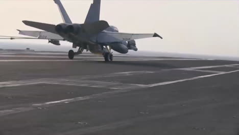 Various-Jet-Aircraft-Land-On-The-Deck-Of-An-Aircraft-Carrier-2