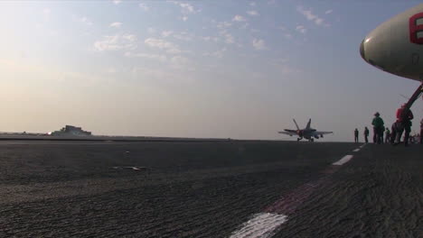 Various-Jet-Aircraft-Land-On-The-Deck-Of-An-Aircraft-Carrier-4