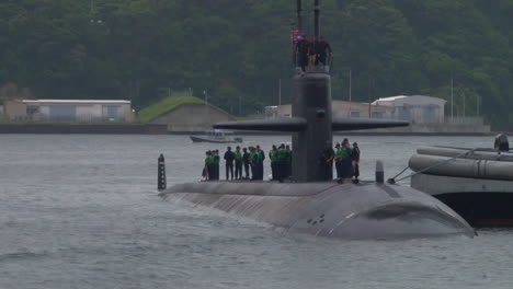 The-Uss-Oklahoma-City-Submarine-Enters-A-Harbor-In-Japan-1