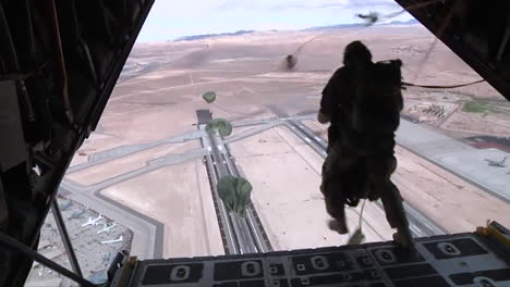 Paratroopers-Jump-From-An-Airplane-Over-An-Airfield