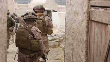 Us-Marines-British-Forces-And-Navy-Seals-Conduct-A-Patrol-In-A-Simulated-African-Village-5