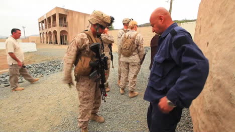 Us-Marines-And-Navy-Seals-Walk-On-Patrol-Through-A-Simulated-Arab-Village-4