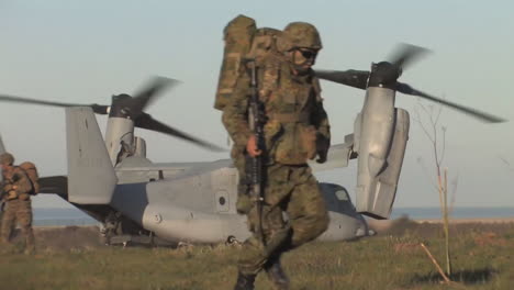 American-Marines-Emerge-From-Osprey-Helicopters-On-A-Simulated-Mission-1