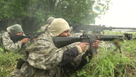 French-Infantry-Perform-Intense-Simulated-Battlefield-Conflicts-In-A-Forest-Environment