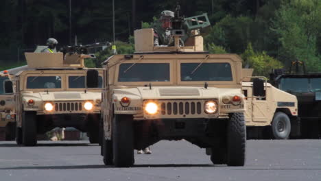 Us-Military-Humvees-Move-Down-A-Road