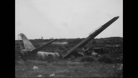 Soldiers-Look-At-The-Destroyed-Wreckage-Of-Planes-And-Other-War-Materials-From-The-Pacific-Islands-During-World-War-Two-4