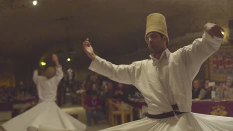 Whirling-Dervishes-Spin-In-A-Trance-In-A-Darkened-Mosque-In-Turkey-2