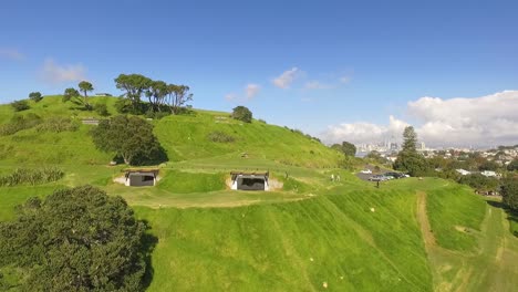 An-aerial-view-pulls-out-from-Maungauika-the-North-Head-on-Auckland-New-Zealand