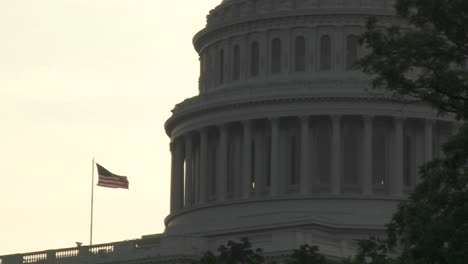 Pull-back-from-the-Capitol-Building-in-Washington-DC-with-an-American-flag-visible