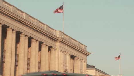Flags-fly-atop-buildings-in-Washington-DC-1