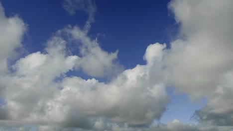 Time-lapse-of-clouds-against-blue-sky-moving-forward-2