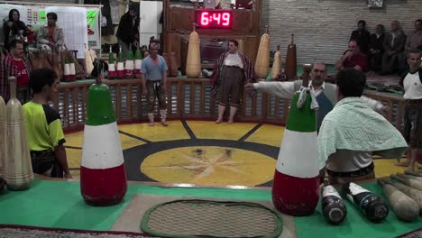 A-man-spinning-in-a-circle-demonstrates-the-traditional-Iranian-martial-art-of-Pahlavani