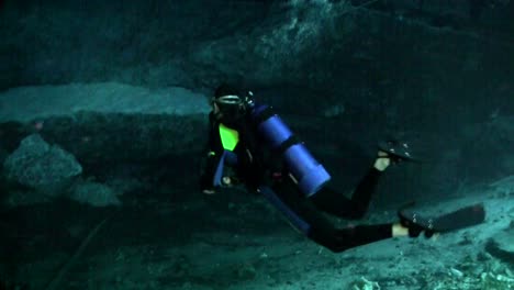 A-scuba-diver-explores-underwater-caves-in-Florida