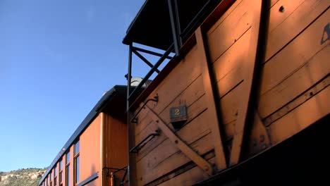 Tourists-pass-by-on-an-excursion-train