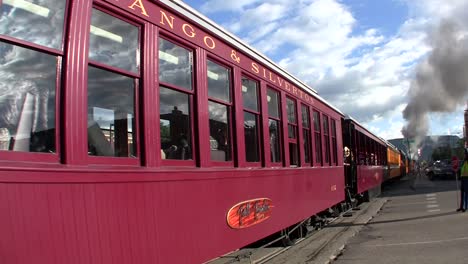 Tourists-pass-by-on-an-excursion-train-1