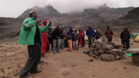 Porters-dance-at-the-base-of-the-mountain