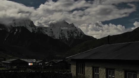 Pheriche-village-at-night-with-clouds-rolling