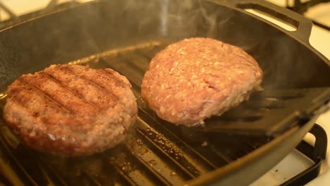 Hamburger-patties-grill-on-a-barbeque