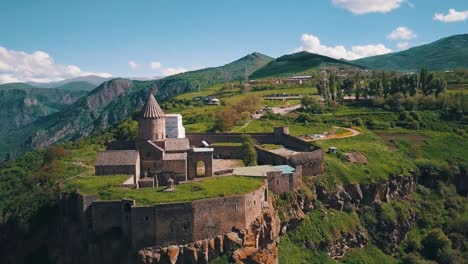 Aerial-of-a-beautiful-Tatev-Monastery-church-in-the-Caucasus-mountains-of-Armenia