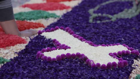 Locals-decorate-an-alfombra-or-carpet-during-Semana-Santa-Easter-week-in-Antigua-Guatemala-6