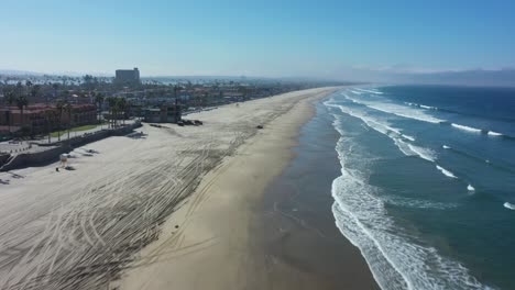 Aerial-of-empty-abandoned-beaches-of-southern-california-with-no-one-during-covid19-coronavirus-epidemic-as-people-stay-home-en-masse