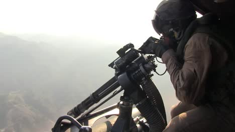 Marines-Fire-On-The-Enemy-From-A-Helicopter-Using-Machine-Guns-1