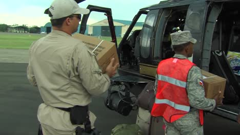 médico-Personnel-And-Relief-Supplies-Are-Flown-Into-Haiti-Following-The-Devastating-Earthquake-In-2010