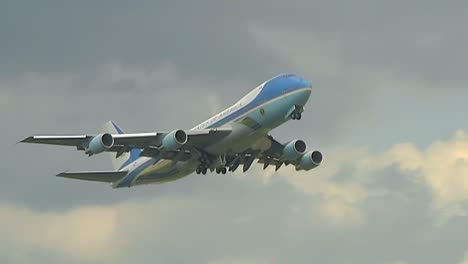 Air-Force-One-Takes-Off-And-Flies-Against-A-Beautiful-Cloudy-Sky