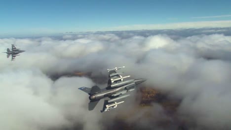 F16-Fighter-Jets-Peel-Off-In-Formation