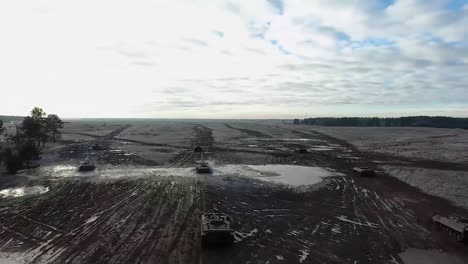 A-Montage-Of-Aerials-Over-Tanks-In-The-Battlefield