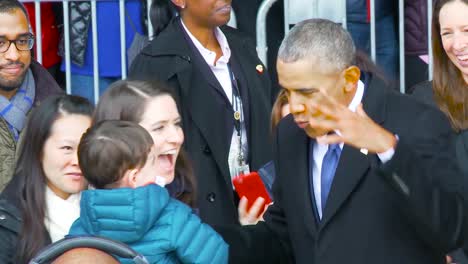 President-Barack-Obama-Is-Warmly-Greeted-By-Members-Of-The-Public-And-Military