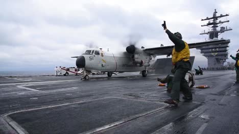 The-Grumann-C2-Greyhound-Takes-Off-From-An-Aircraft-Carrier