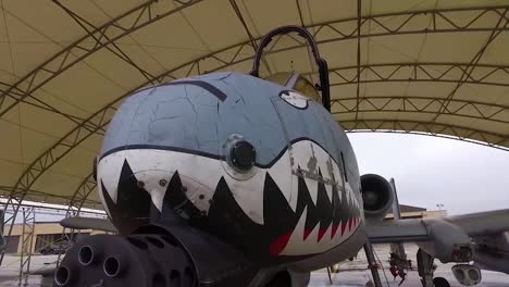 A-Jet-With-A-Shark-Painted-On-The-Nose-Is-Prepared-In-A-Hanger