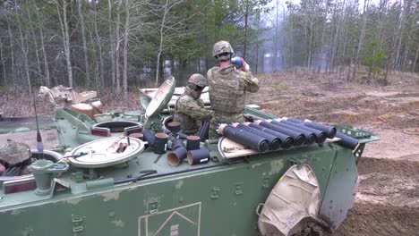 American-Soldiers-Load-Ammunition-On-A-Tank-For-A-Test-Firing-In-Latvia