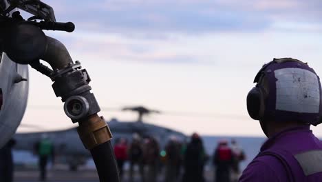 An-Aircraft-Gets-Fueled-On-The-Deck-Of-The-Uss-George-Hw-Bush-While-Other-Jets-Are-Moved-Into-Place