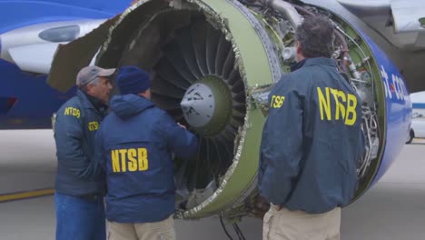 Ntsb-Inspectors-Look-At-An-Aircraft-Engine-Which-Expoded-In-Midair-During-A-Southwest-Airlines-Flight-2
