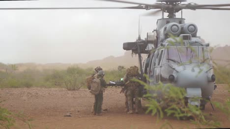 Us-Airmen-Load-A-Stretcher-Onto-A-Helicopter-As-Part-Of-The-Angel-Thunder-Training-Exercise