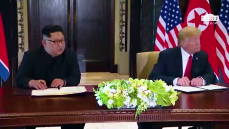 Us-President-Donald-Trump-And-North-Korean-Dictator-Kim-Jong-Un-Sign-A-Document-During-Their-Historic-Singapore-Summit-Meeting-1