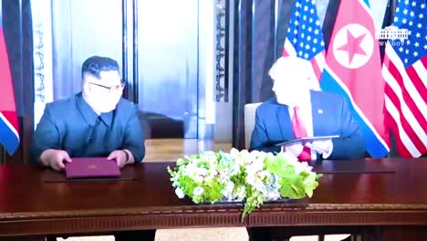 Us-President-Donald-Trump-And-North-Korean-Dictator-Kim-Jong-Un-Sign-A-Document-During-Their-Historic-Singapore-Summit-Meeting-5