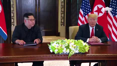 Us-President-Donald-Trump-And-North-Korean-Dictator-Kim-Jong-Un-Sign-A-Document-During-Their-Historic-Singapore-Summit-Meeting-6