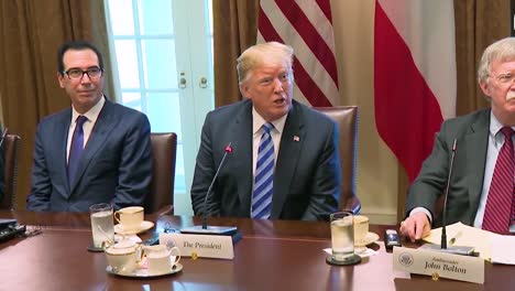 Us-President-Donald-Trump-Speaks-About-The-Threat-Of-Canada-And-Tariffs-And-Trade-Barriers-While-Flanked-By-Steve-Mnuchin-And-John-Bolton