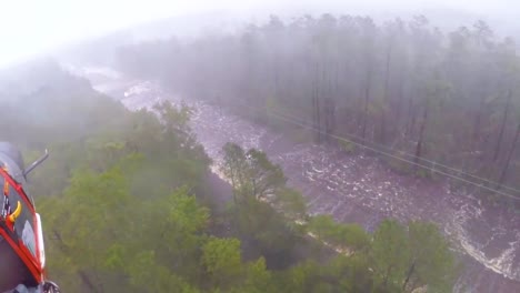 A-Search-And-Rescue-Team-Rescues-A-Man-Trapped-In-Flood-Waters-In-His-Truck-During-Hurricane-Florence-1