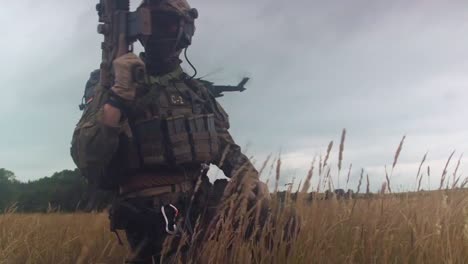 German-Soldiers-Participate-In-A-Rescue-Operation-In-A-Field-With-A-Military-Helicopter-Landing-In-The-Background-1