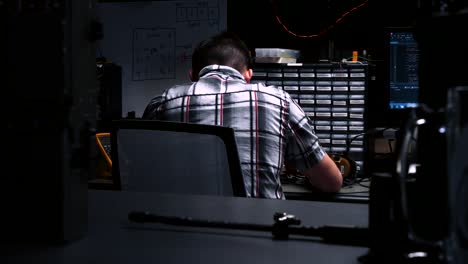 A-Usaf-Airman-Uses-A-Microscope-While-Repairing-A-Small-Circuit-Board