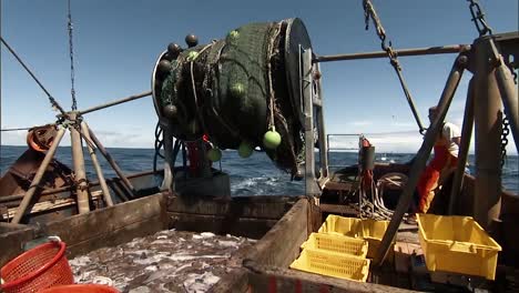 Fishermen-Reel-In-Trawl-Nets