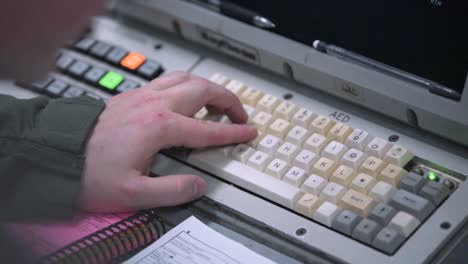 Usaf-Airmen-Are-Seen-Working-In-Communications-Aboard-An-Aircraft